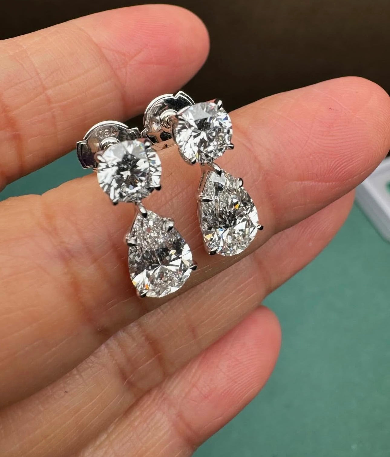 2 Carat Round 4 Carat Pear Earings by luxury souvenir diamonds