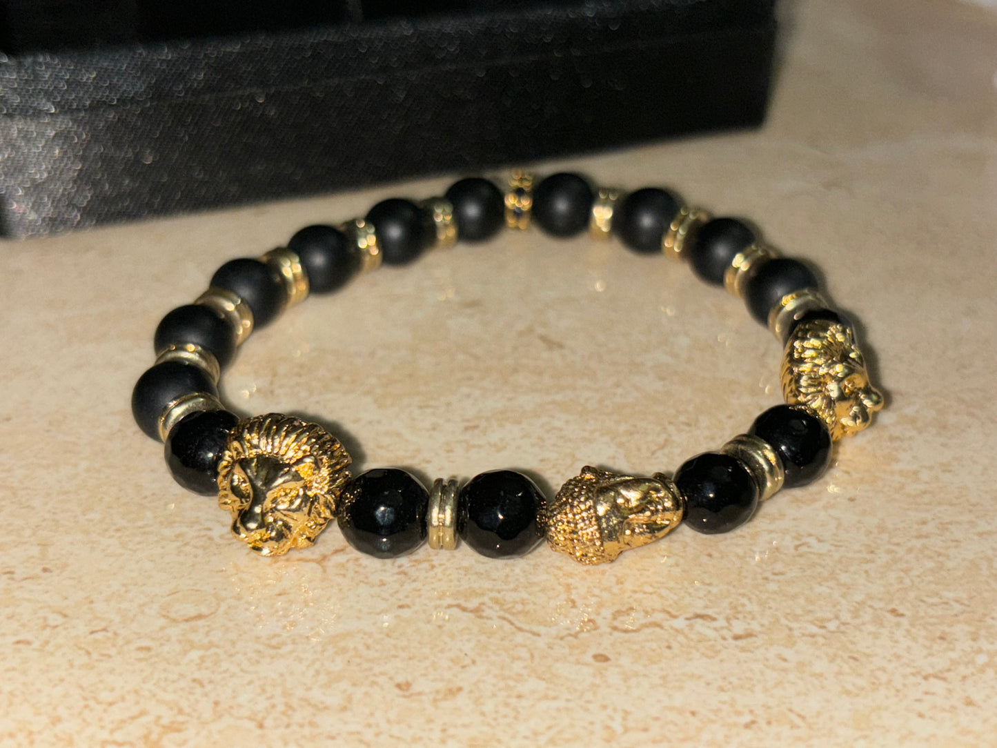 LIONROAR - Dual Lion & 1 Buddha with black gold beads and 24Kt Gold Rings , Limited Edition Bracelet Designed by RRG