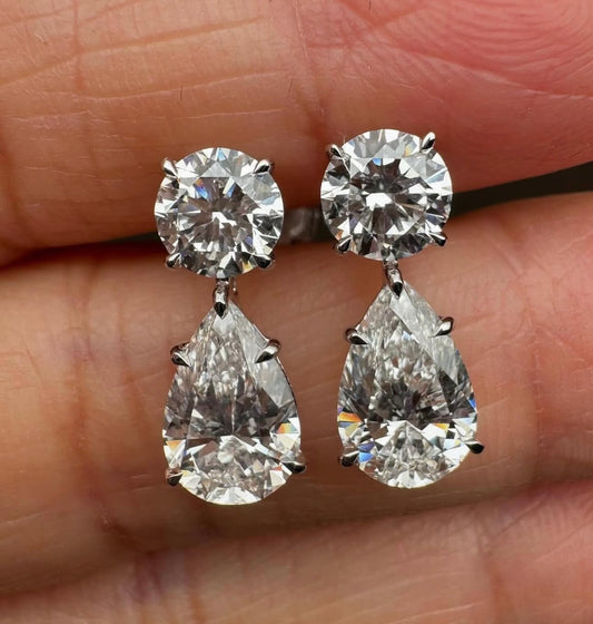 2 Carat Round 4 Carat Pear Earings by luxury souvenir diamonds