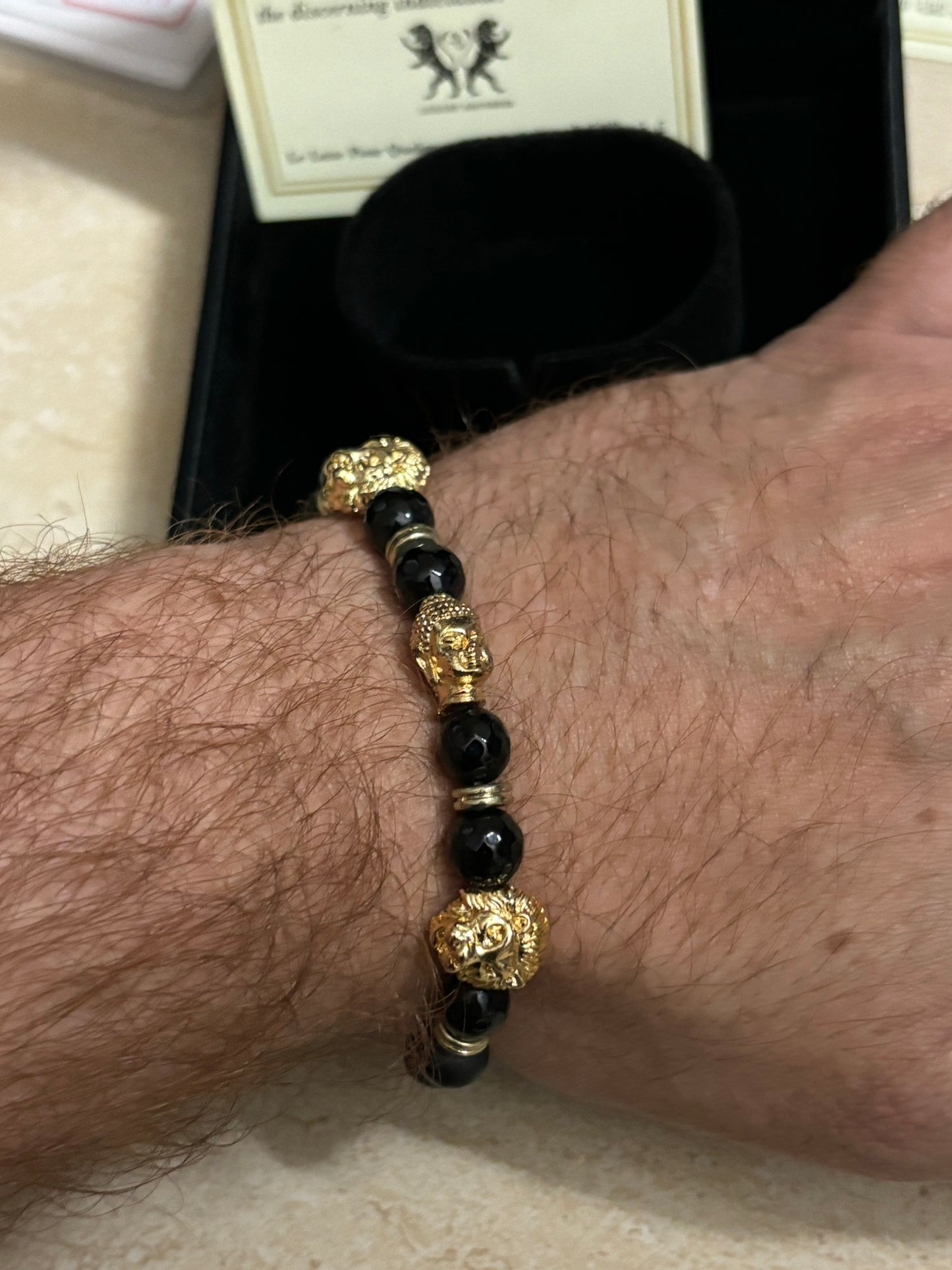 LIONROAR - Dual Lion & 1 Buddha with black gold beads and 24Kt Gold Rings , Limited Edition Bracelet Designed by RRG