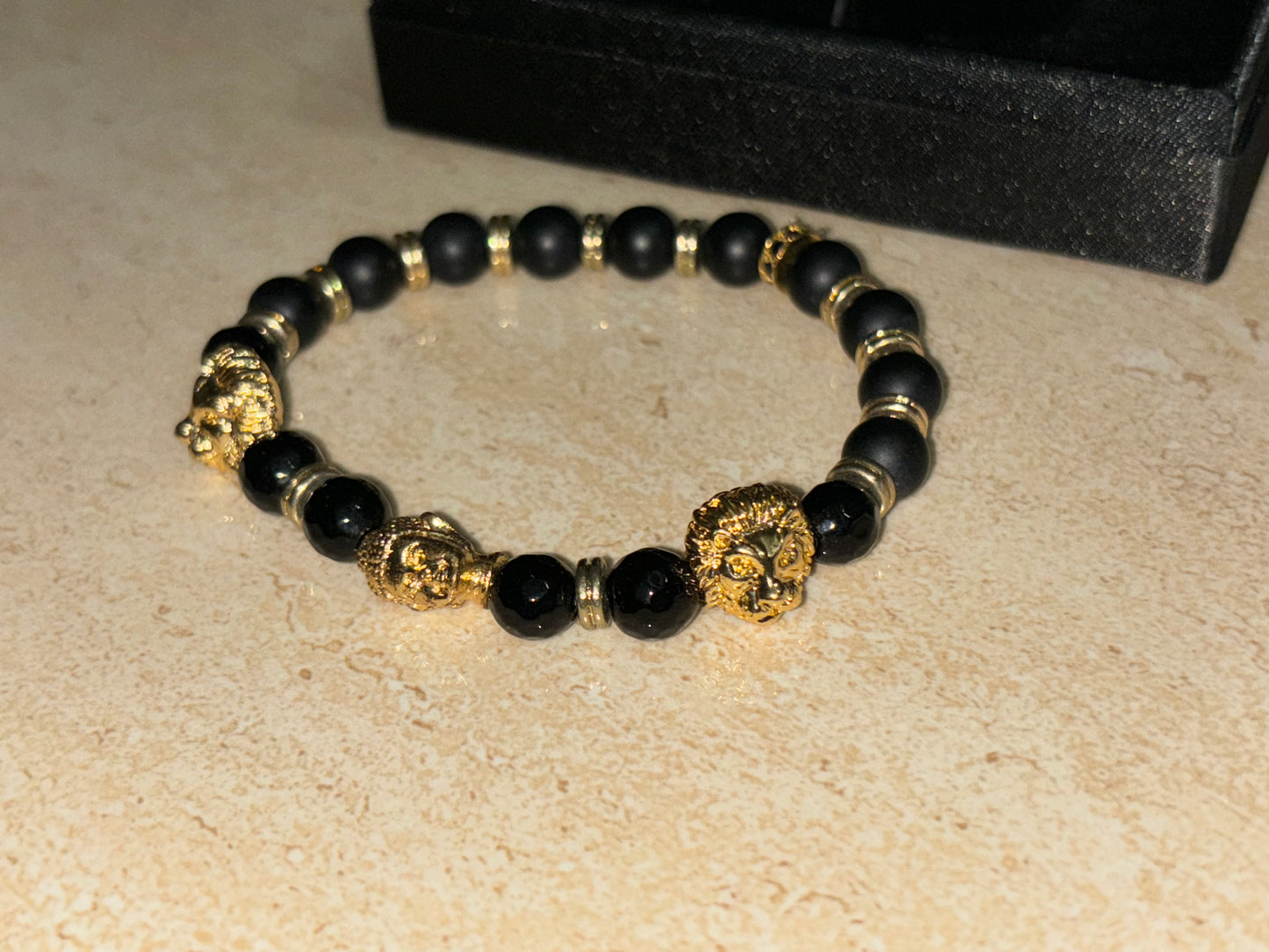 LIONROAR - Dual Lion & 1 Buddha with black gold beads and 24Kt Gold Rings , Limited Edition Bracelet Designed by RRG