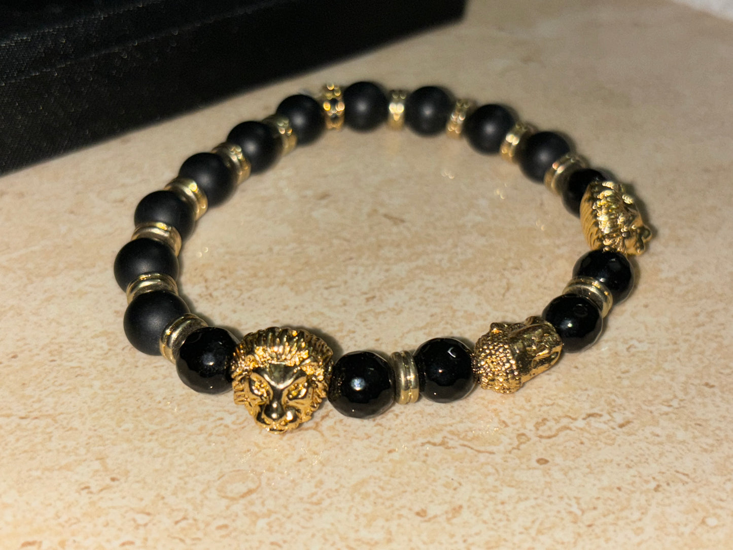 LIONROAR - Dual Lion & 1 Buddha with black gold beads and 24Kt Gold Rings , Limited Edition Bracelet Designed by RRG